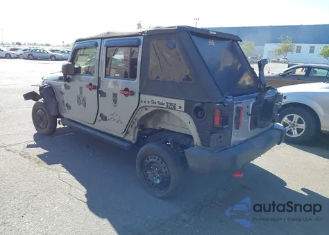 2015 Jeep Wrangler Unlimited Sport z USA, uszkodzony, nr VIN 1C4BJWDG7FL587014